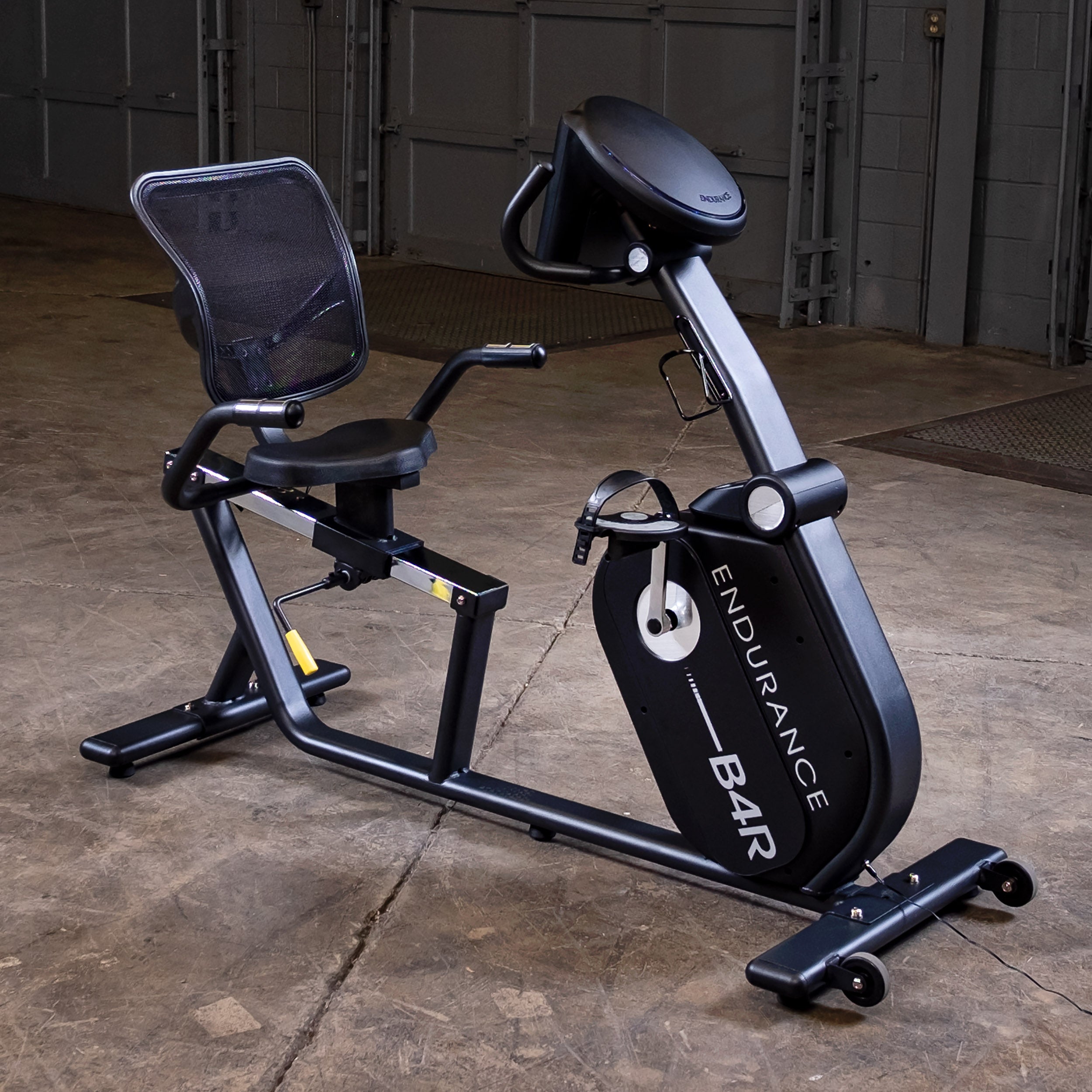 Body-Solid Endurance B4RB recumbent bike in workout space setting