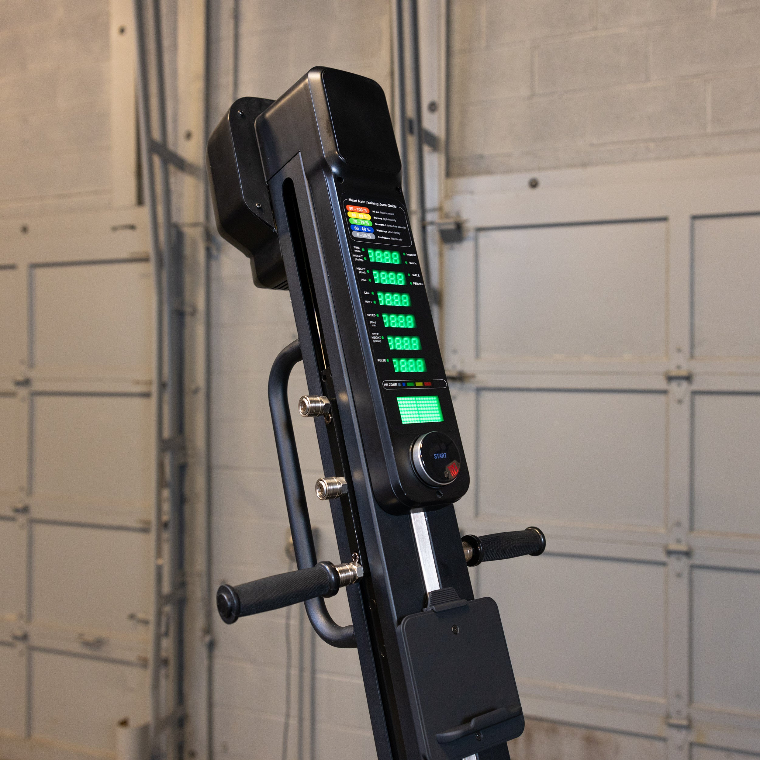 Body-Solid Endurance CL300 vertical climber console display showing workout metrics and control panel