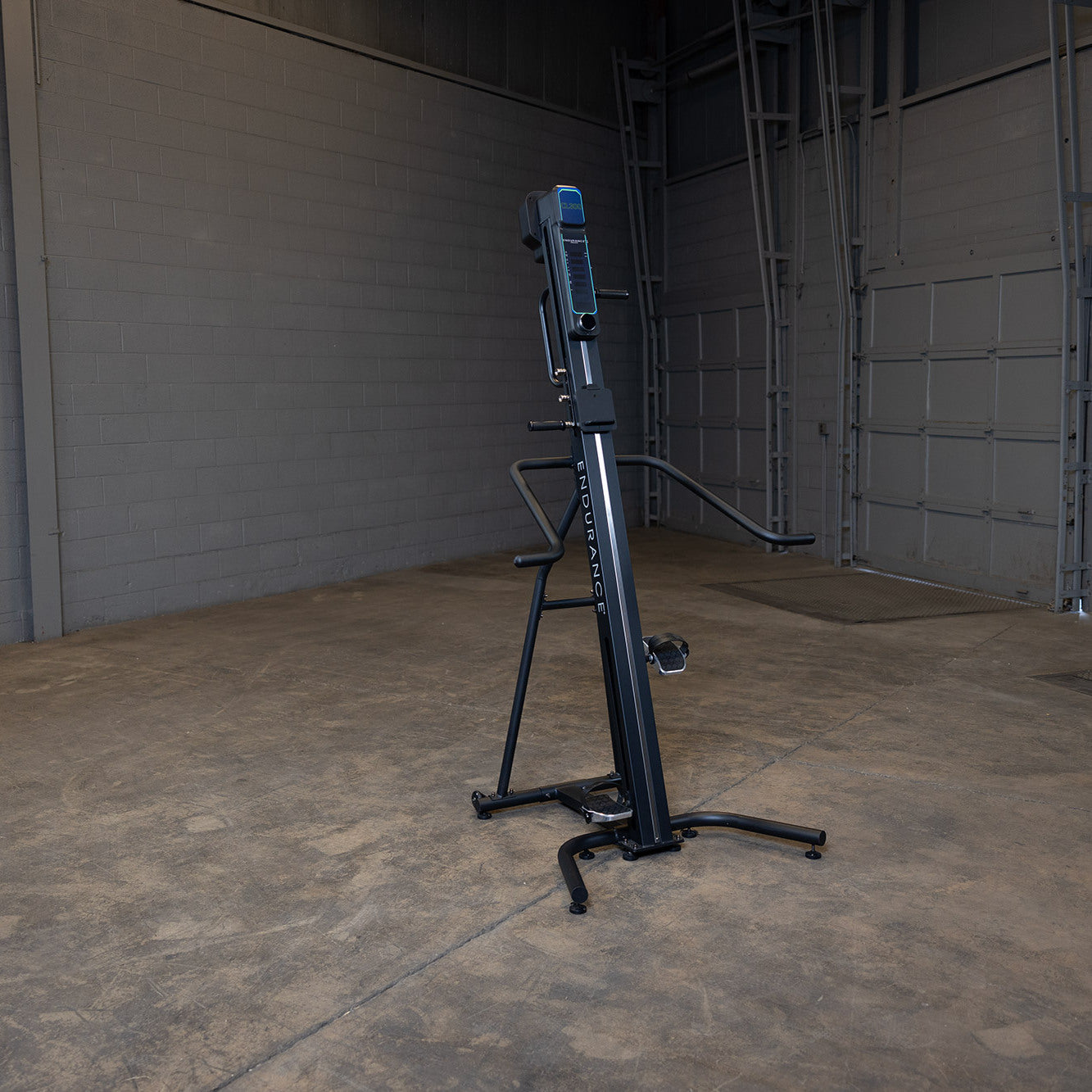 Body-Solid Endurance CL300 vertical climber machine in home gym setting showing full-body low-impact cardio equipment