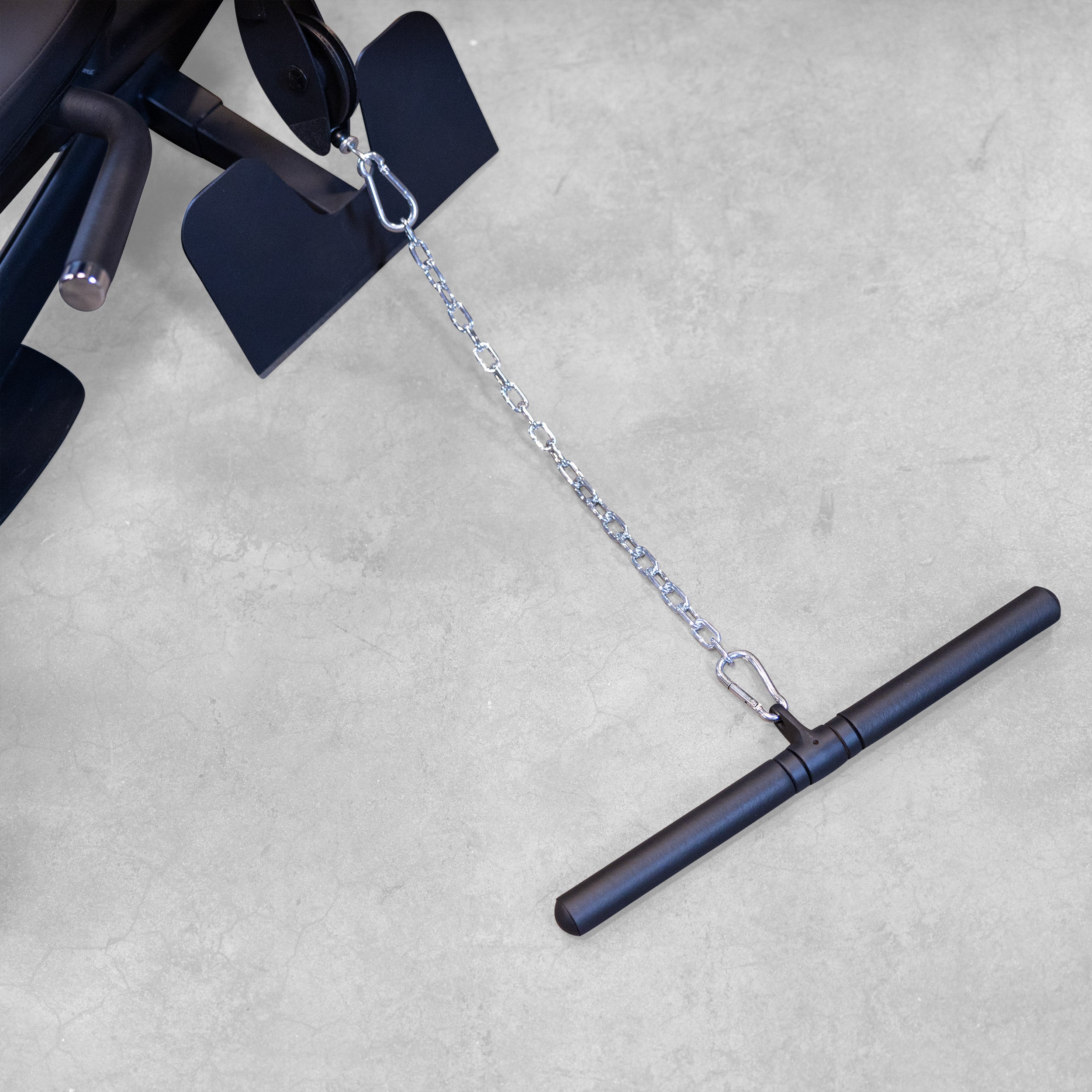 Close-up of the low row bar attachment connected to the low pulley on the Body-Solid Fusion 500B Personal Trainer