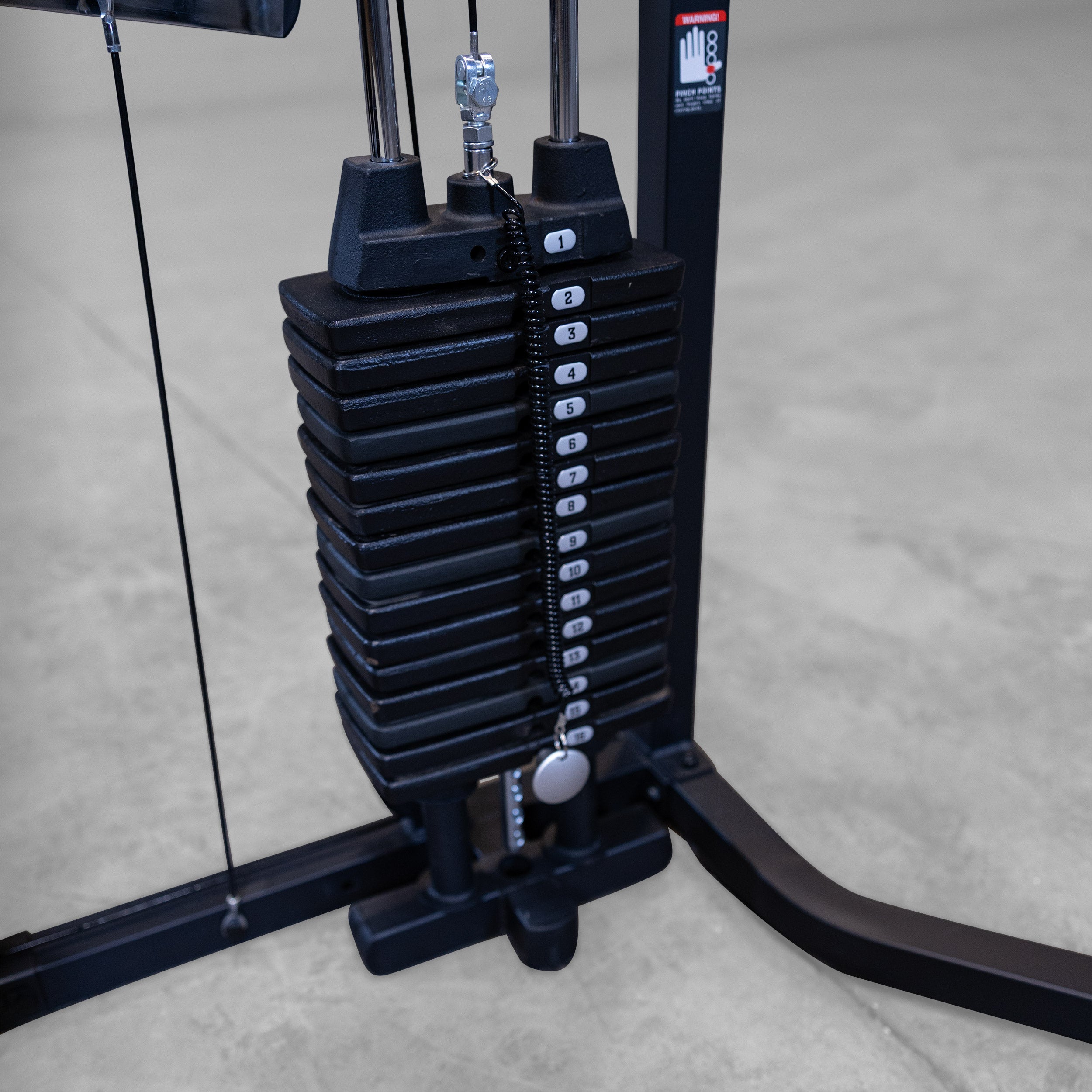 Close up of the Body-Solid G3B 160 lb selectorized weight stack and cable system for smooth strength training