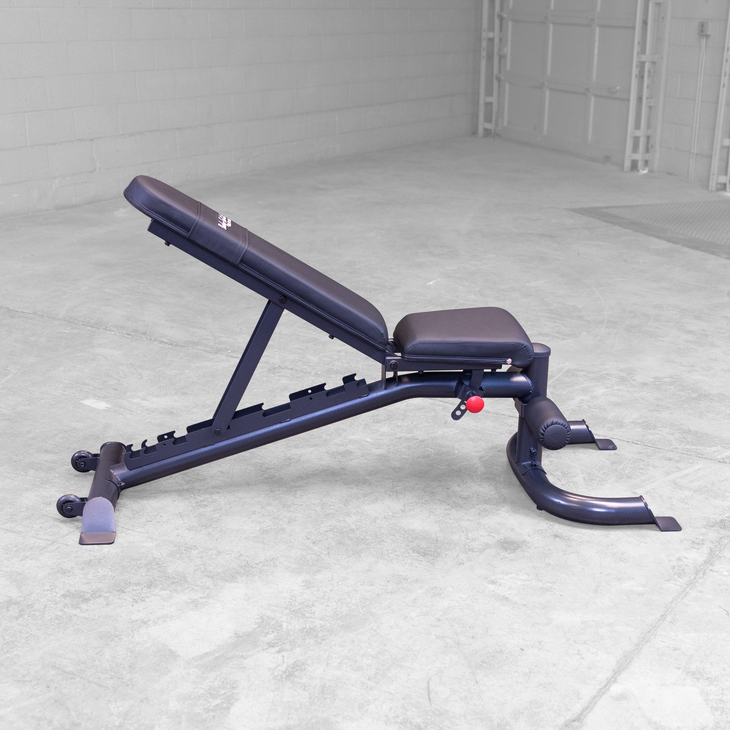 Body Solid GFID100B adjustable weight bench shown in medium incline position for home gym strength training
