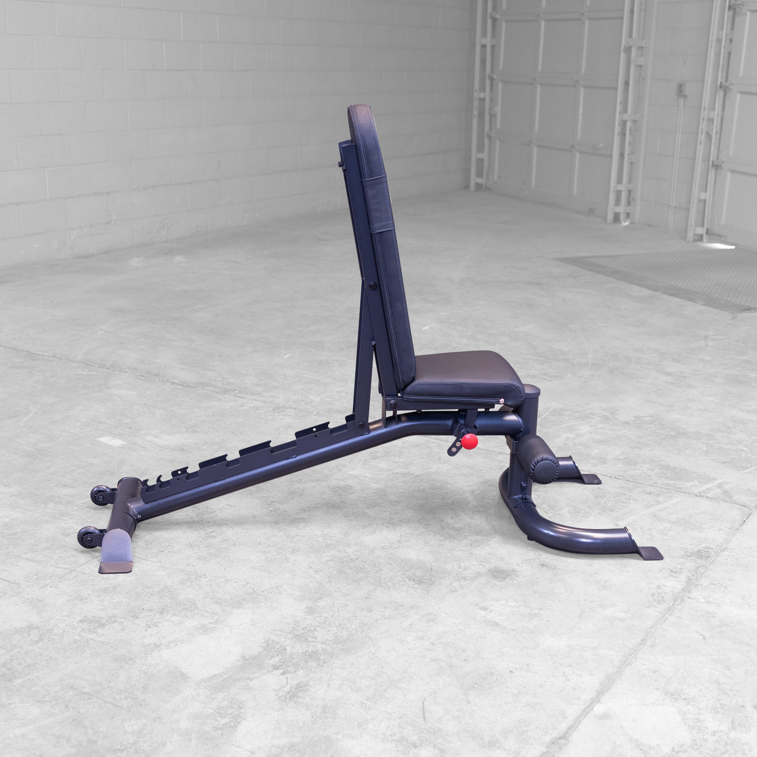 Body Solid GFID100B adjustable weight bench shown in vertical position for home gym strength training