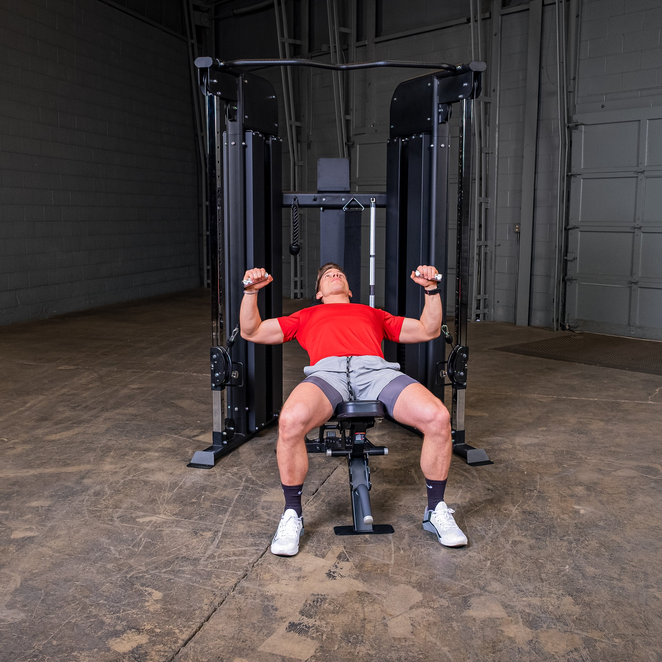 Body-Solid GFT100 functional trainer cable chest press exercise