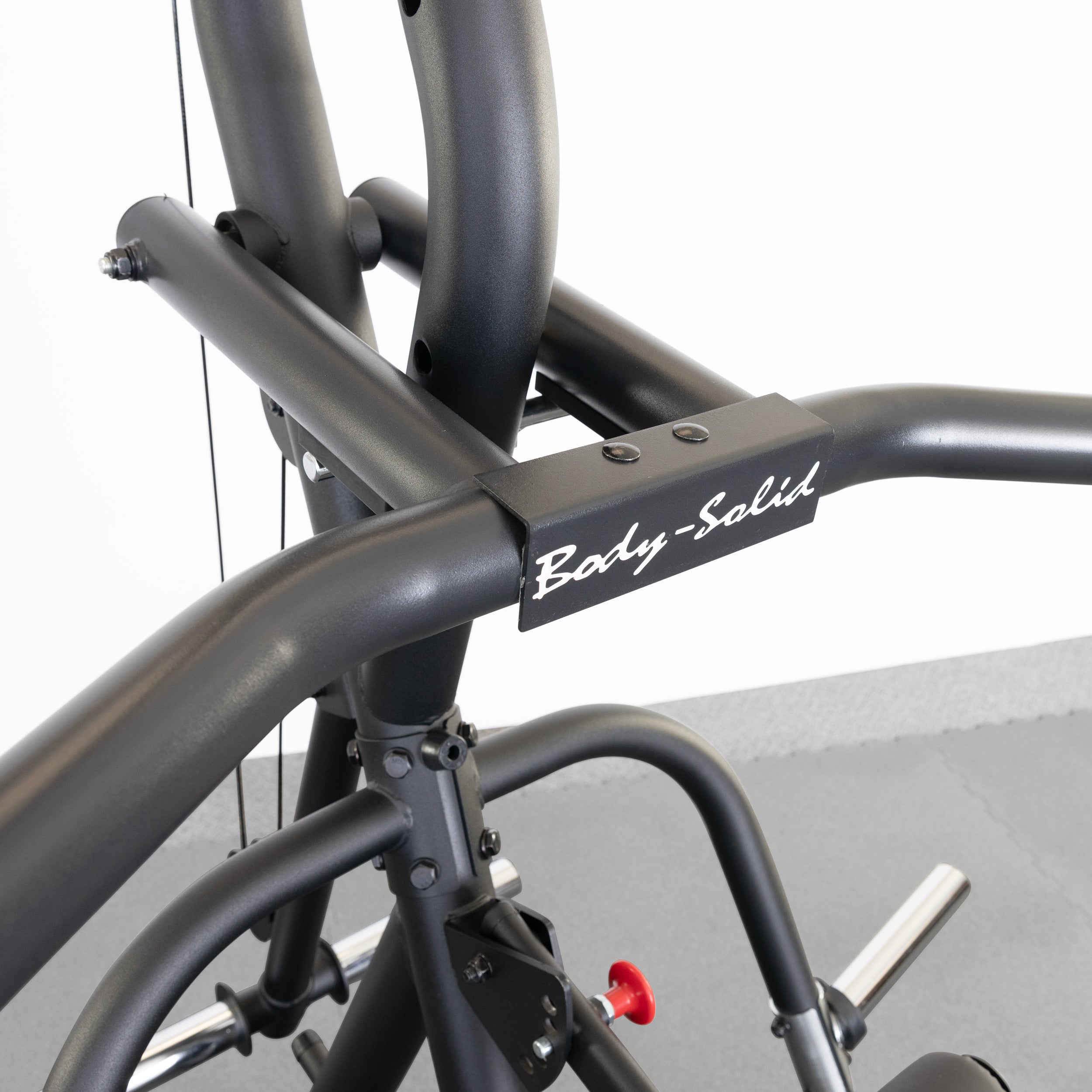 Close-up of the Body-Solid GLGS100B Corner Leverage Gym frame and leverage arm assembly