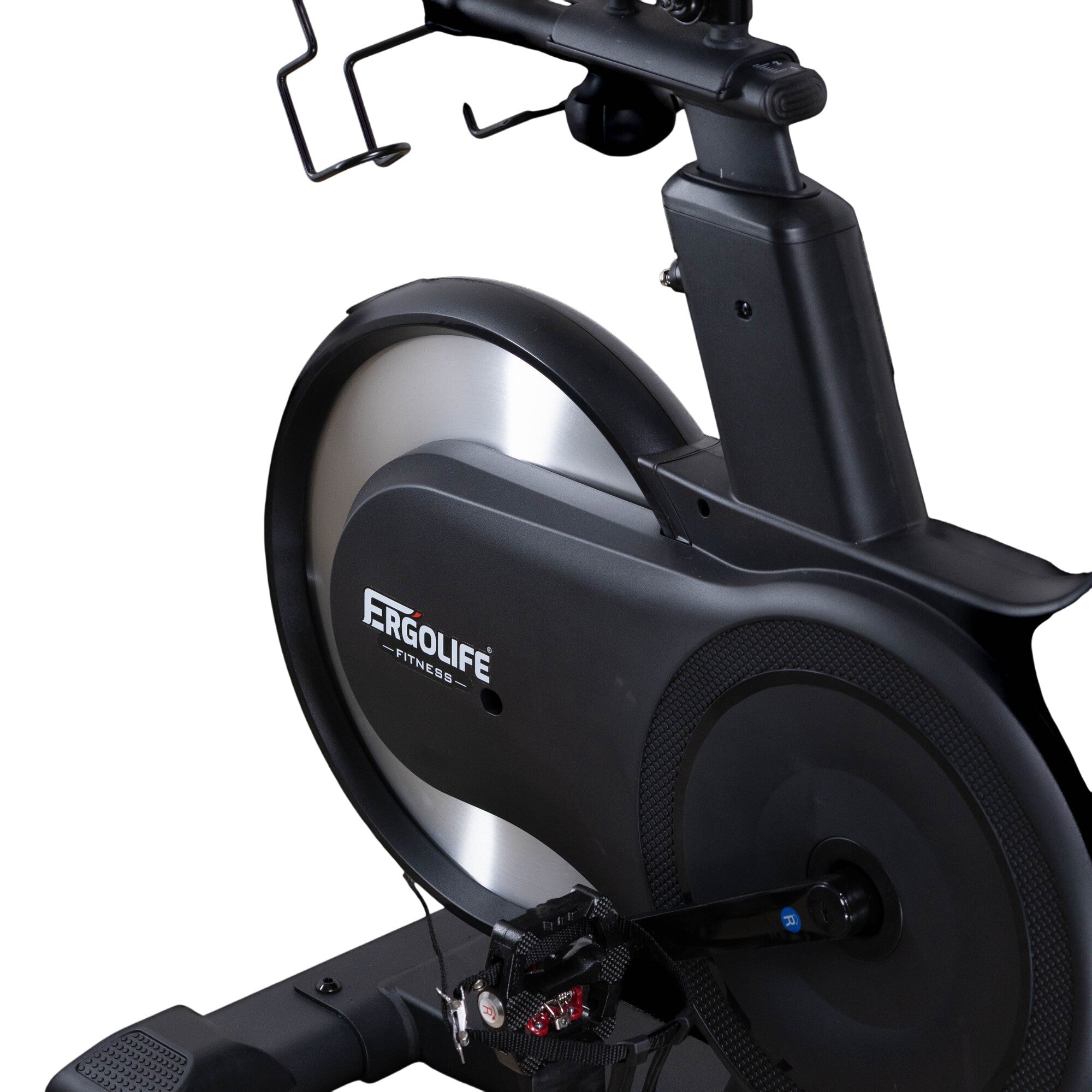 Close-up of the ERGOLIFE 306EFA spin bike featuring the magnetic flywheel, adjustable saddle, water bottle holder, and performance pedals