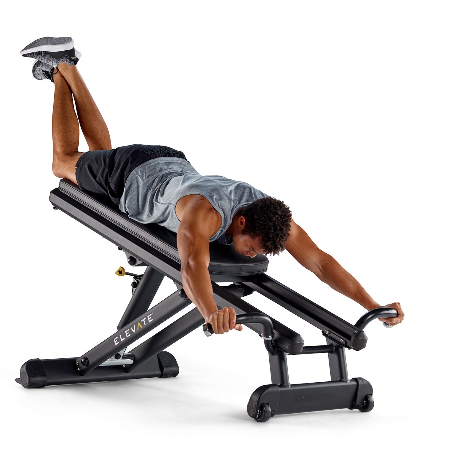 User performing the starting position of a shoulder press exercise on the Total Gym ELEVATE Press