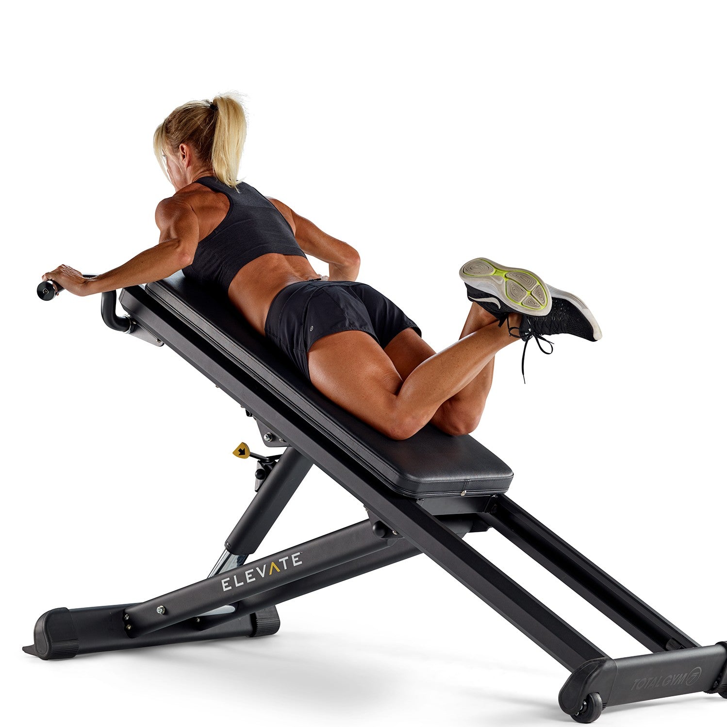 Person performing an assisted pull-up on the Total Gym ELEVATE Pull Up bodyweight resistance trainer