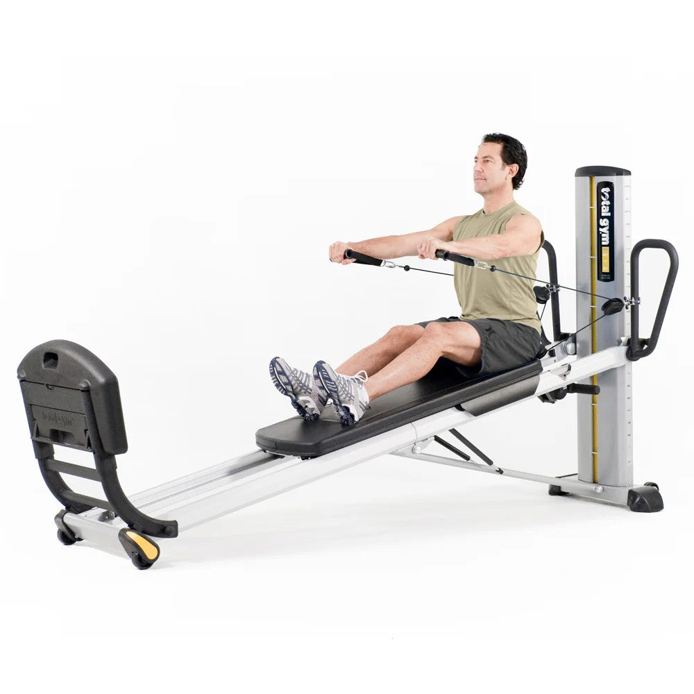 Man using the Total Gym GTS bodyweight training system for a full body workout