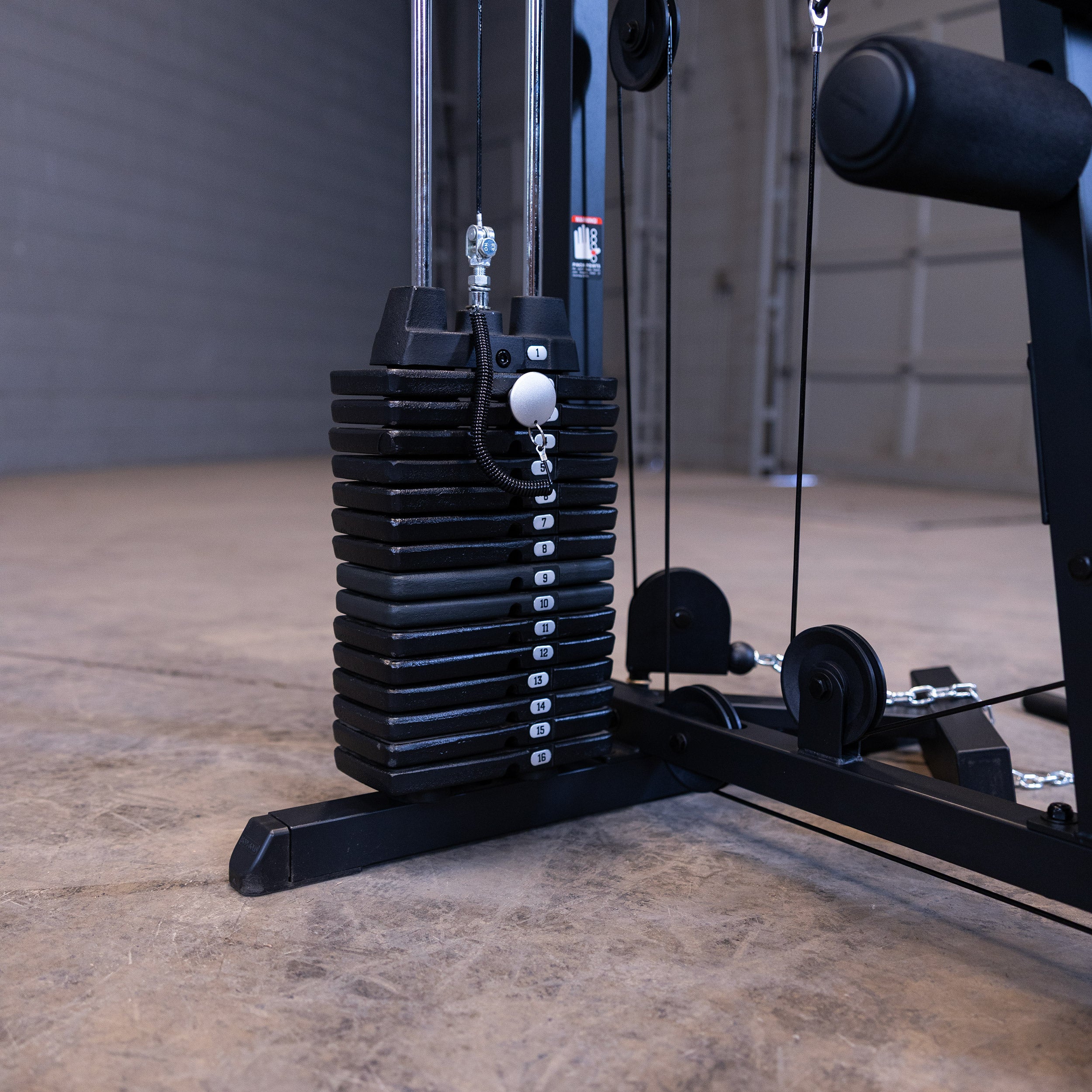 Close up of the Body-Solid G1B 160 lb selectorized weight stack and cable system for smooth strength training