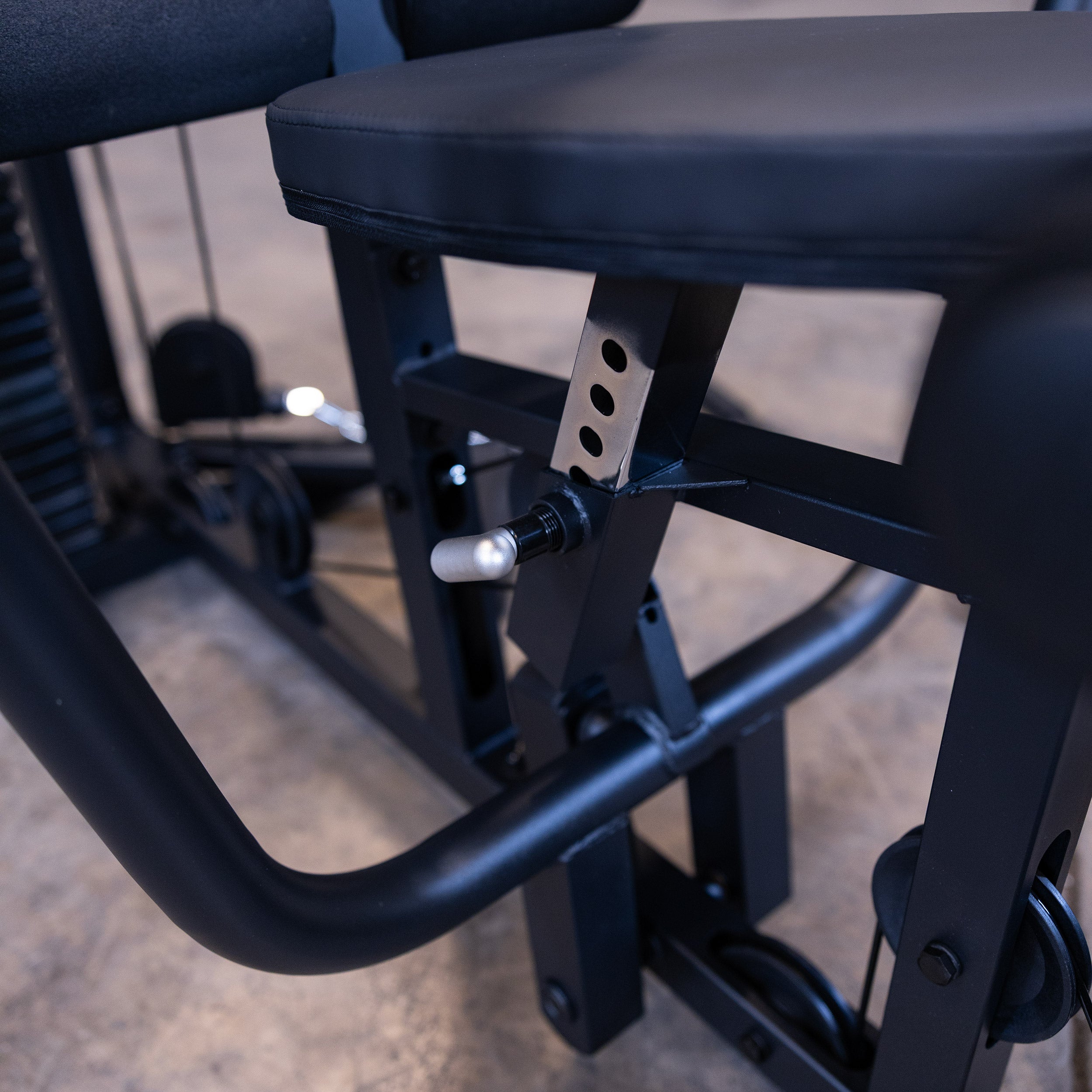 Close up of the adjustable seat on the Body-Solid G1B multi station home gym for customized workout positioning