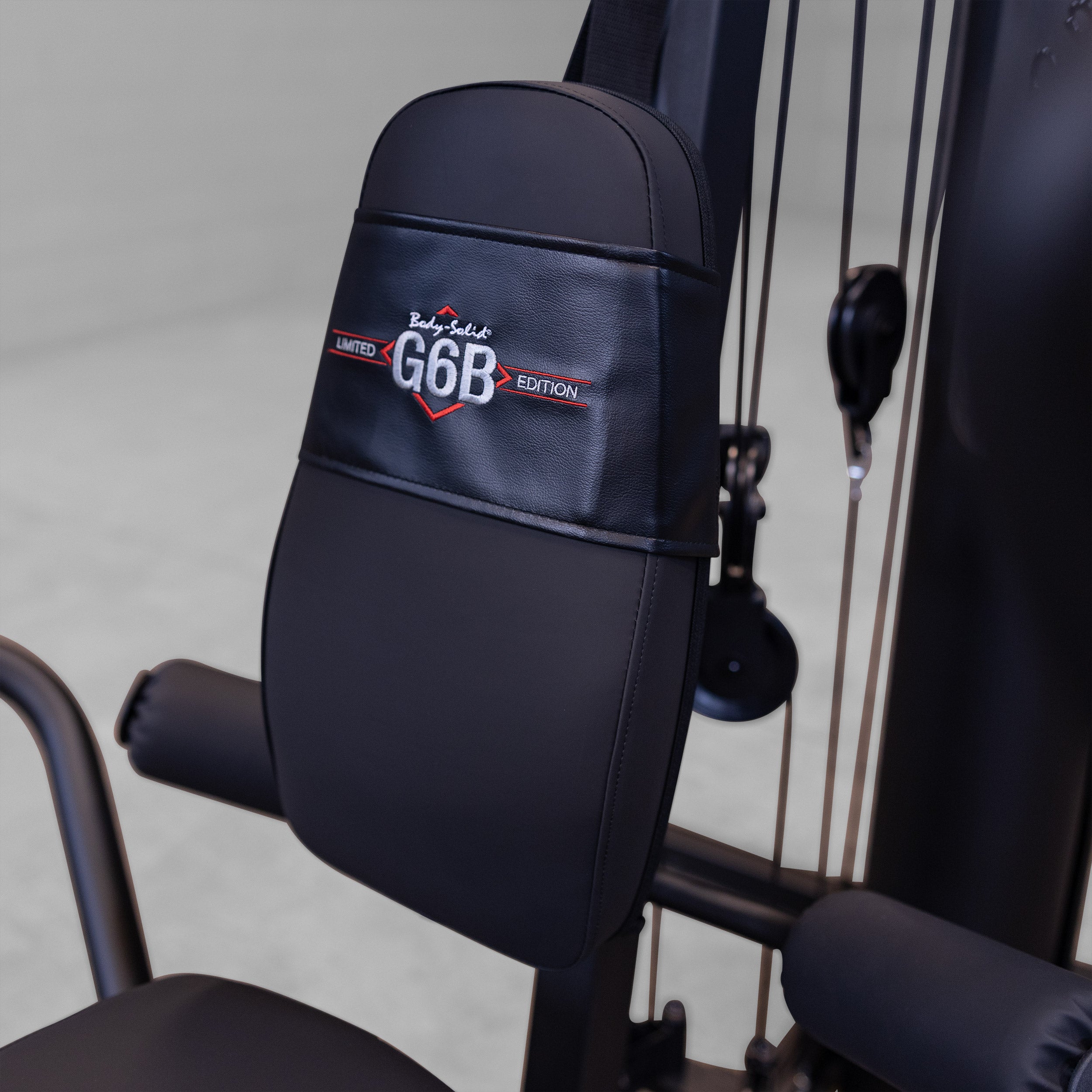 Close up of the Body-Solid G6B DuraFirm back pad with embroidered logo
