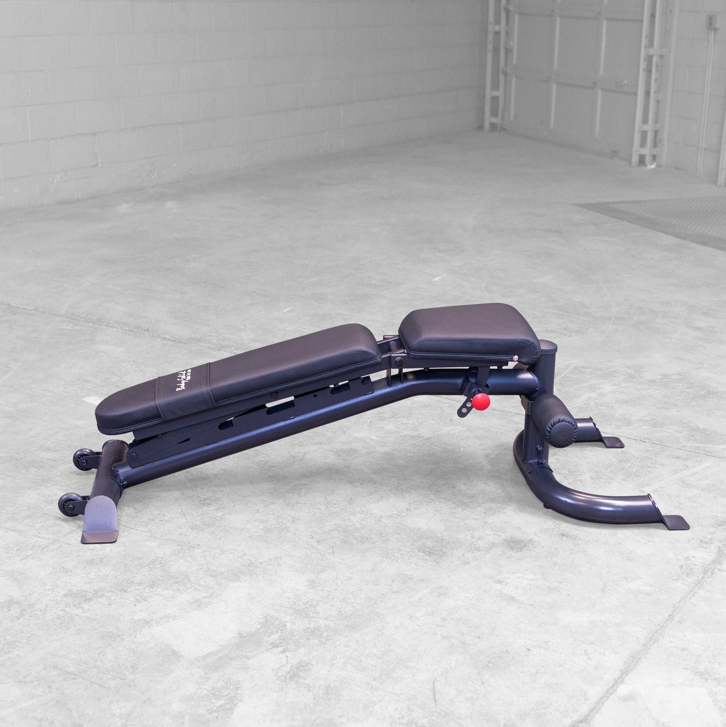Body Solid GFID100B adjustable weight bench shown in decline position for home gym strength training