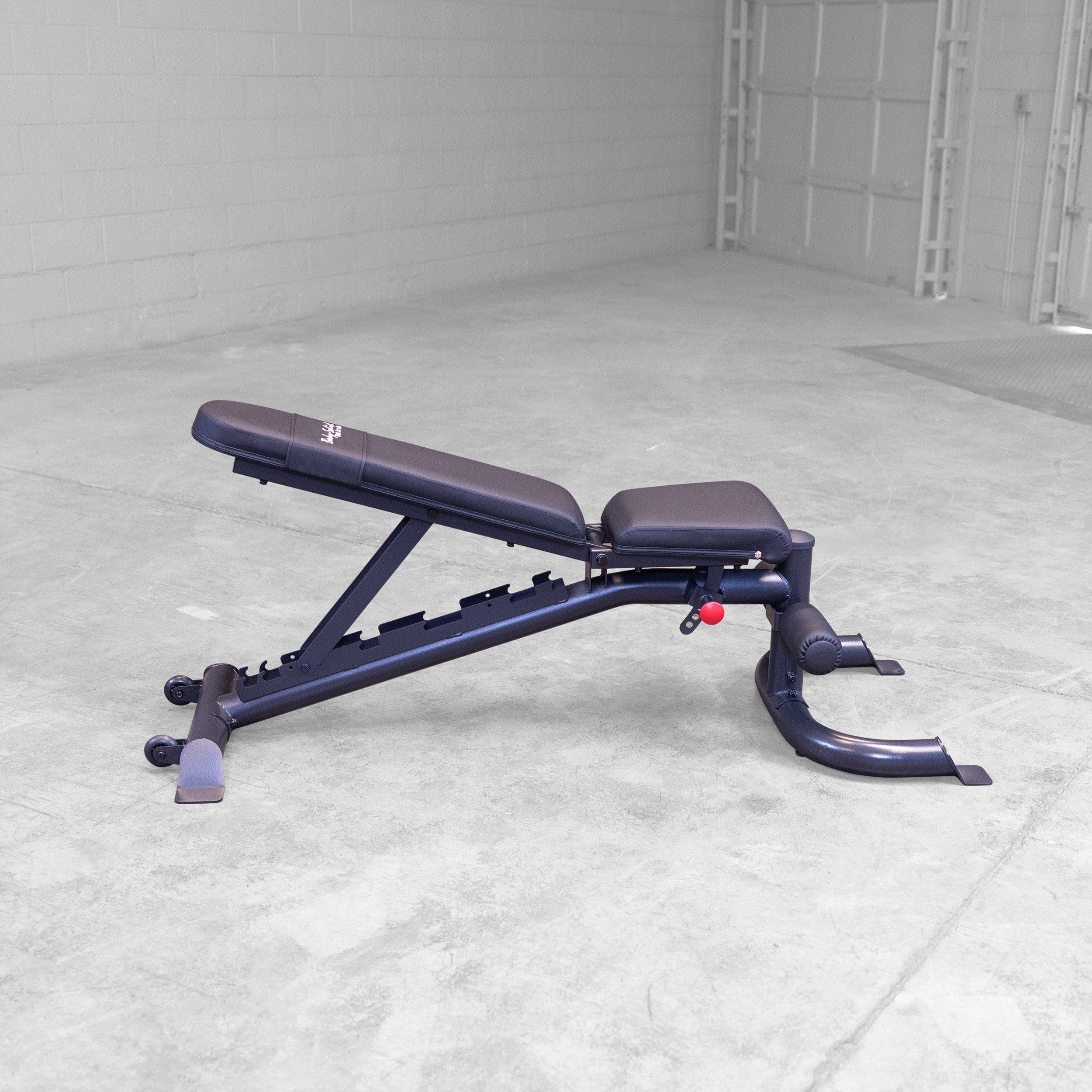 Body Solid GFID100B adjustable weight bench shown in low incline position for home gym strength training