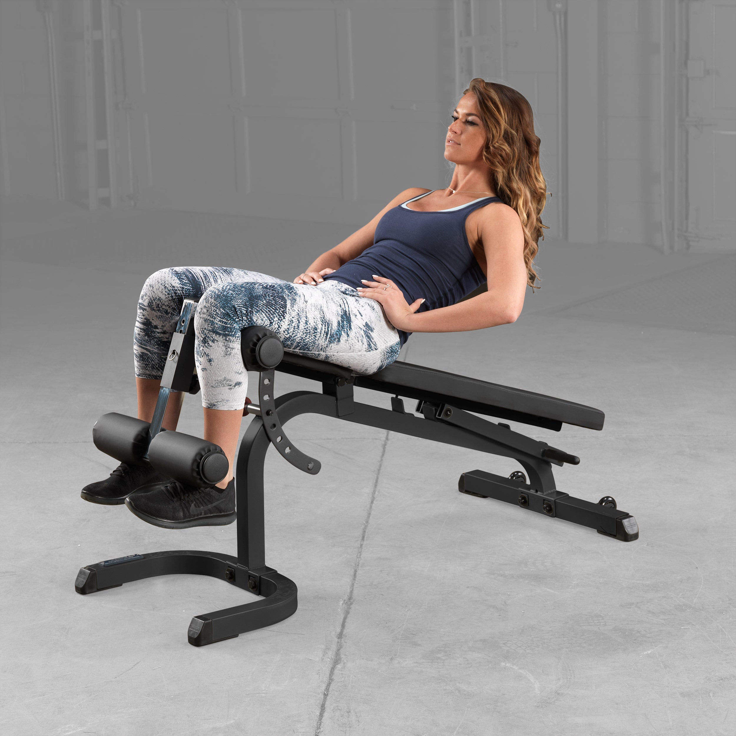 Body-Solid GFID31B flat incline decline adjustable weight bench used for decline abdominal crunches