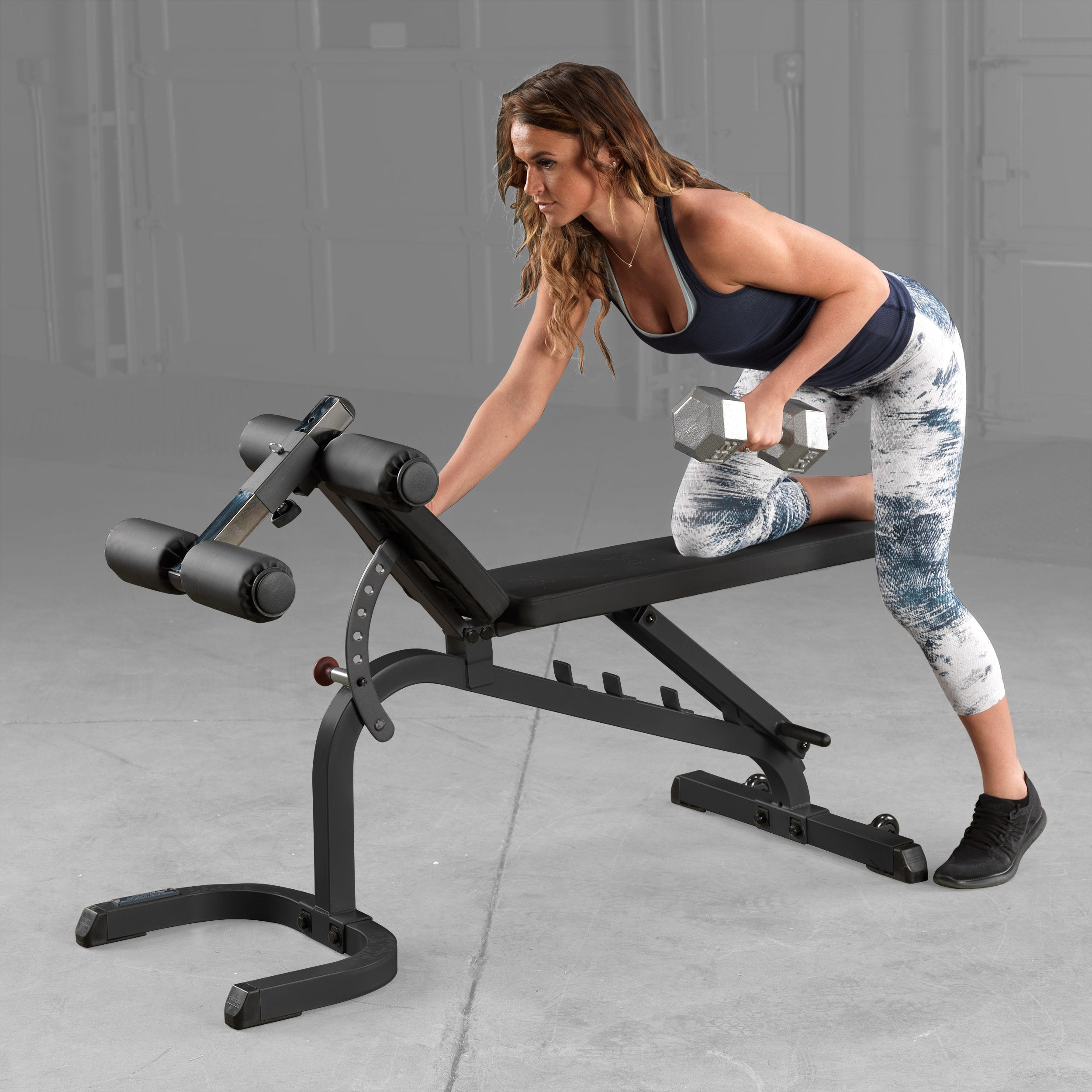 Body-Solid GFID31B flat incline decline adjustable weight bench used for single-arm dumbbell rows