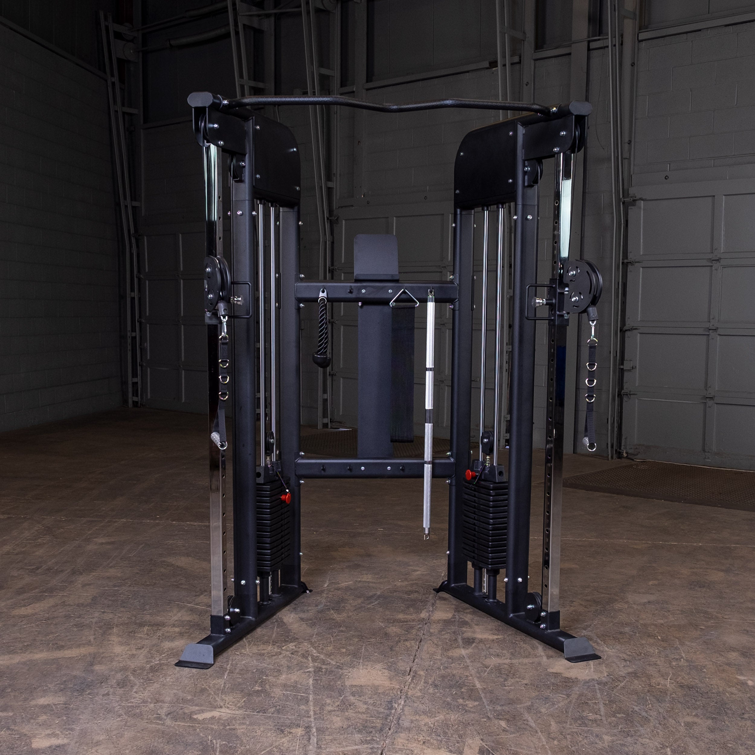 Body-Solid GFT100 functional trainer cable machine in gym setting