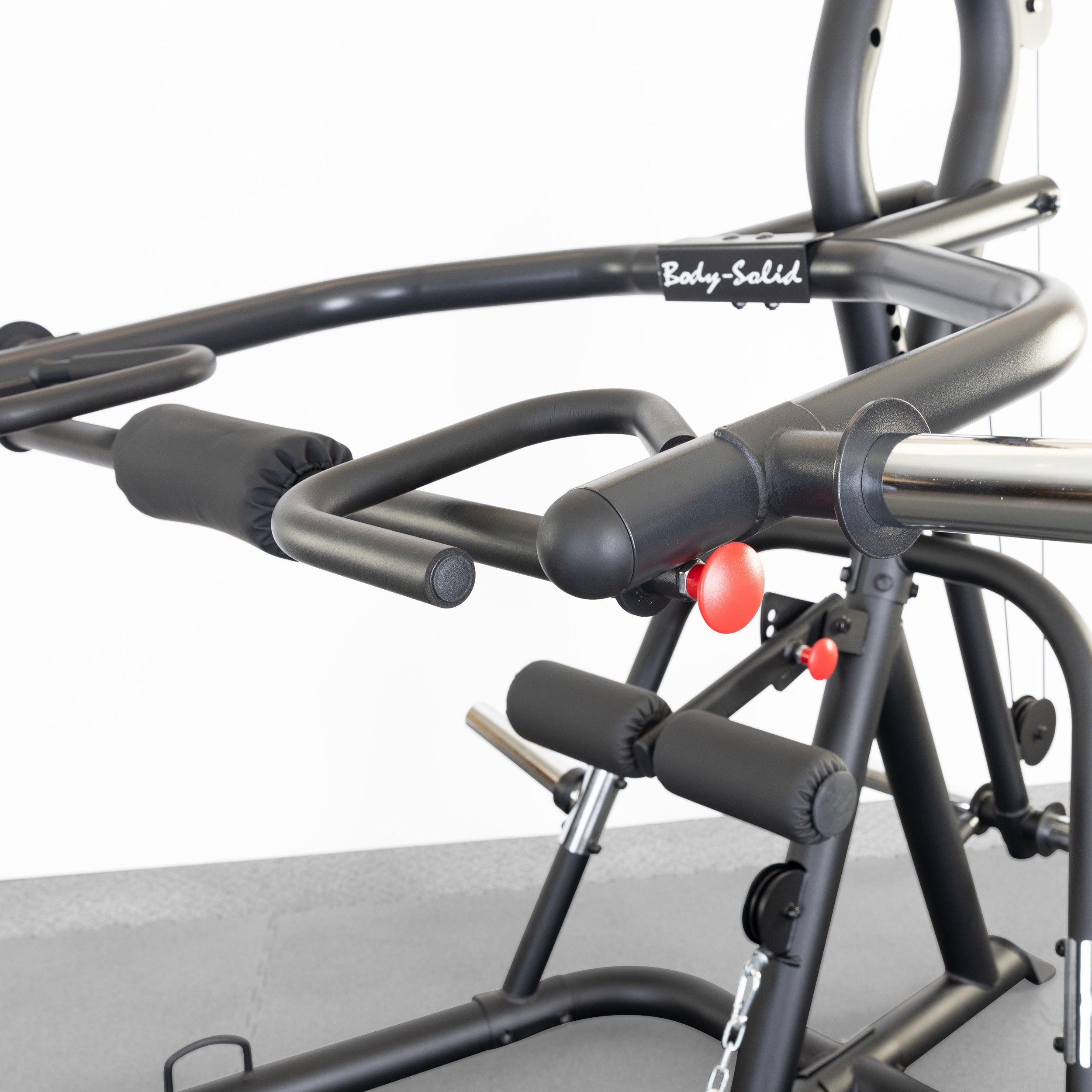Close-up of the Body-Solid GLGS100B Corner Leverage Gym leverage arms and plate horns
