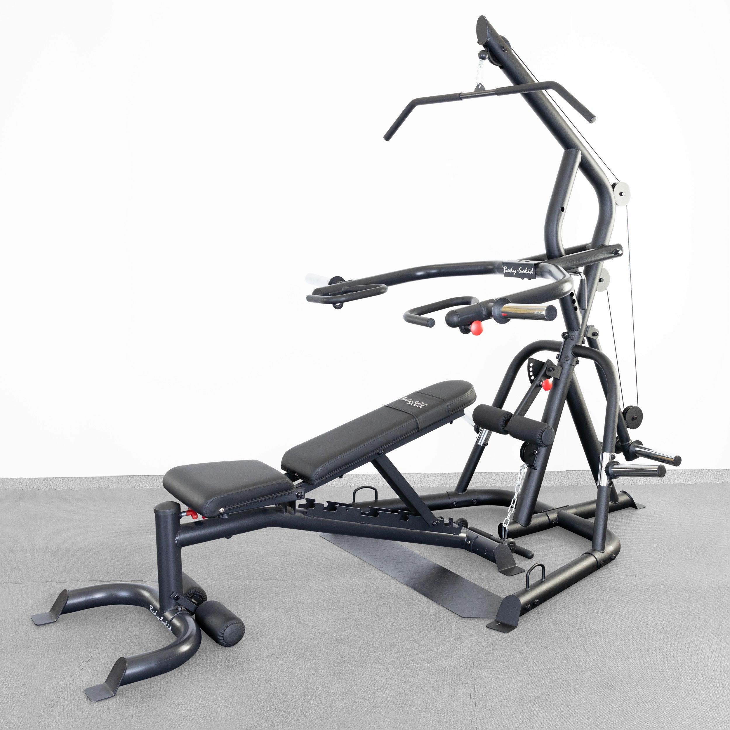 Body-Solid GLGS100BP4 Corner Leverage Gym package with GFID100B adjustable weight bench in a home gym setting