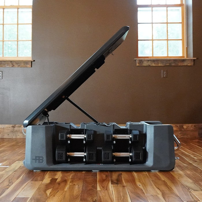 FITBENCH FREE adjustable workout bench open showing internal dumbbell storage