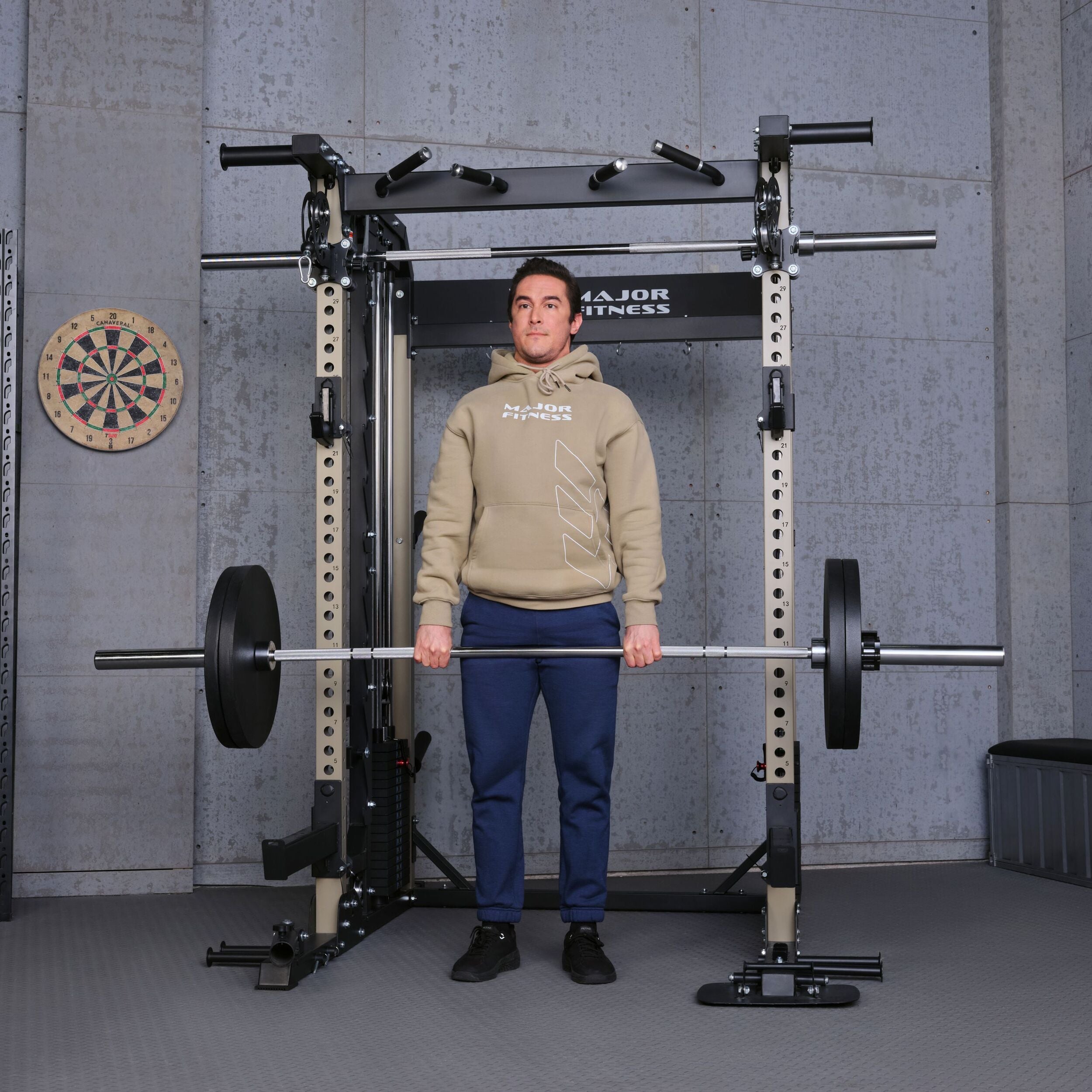 Athlete performing deadlift exercise with the Major Fitness B52 Pro all in one smith machine home gym