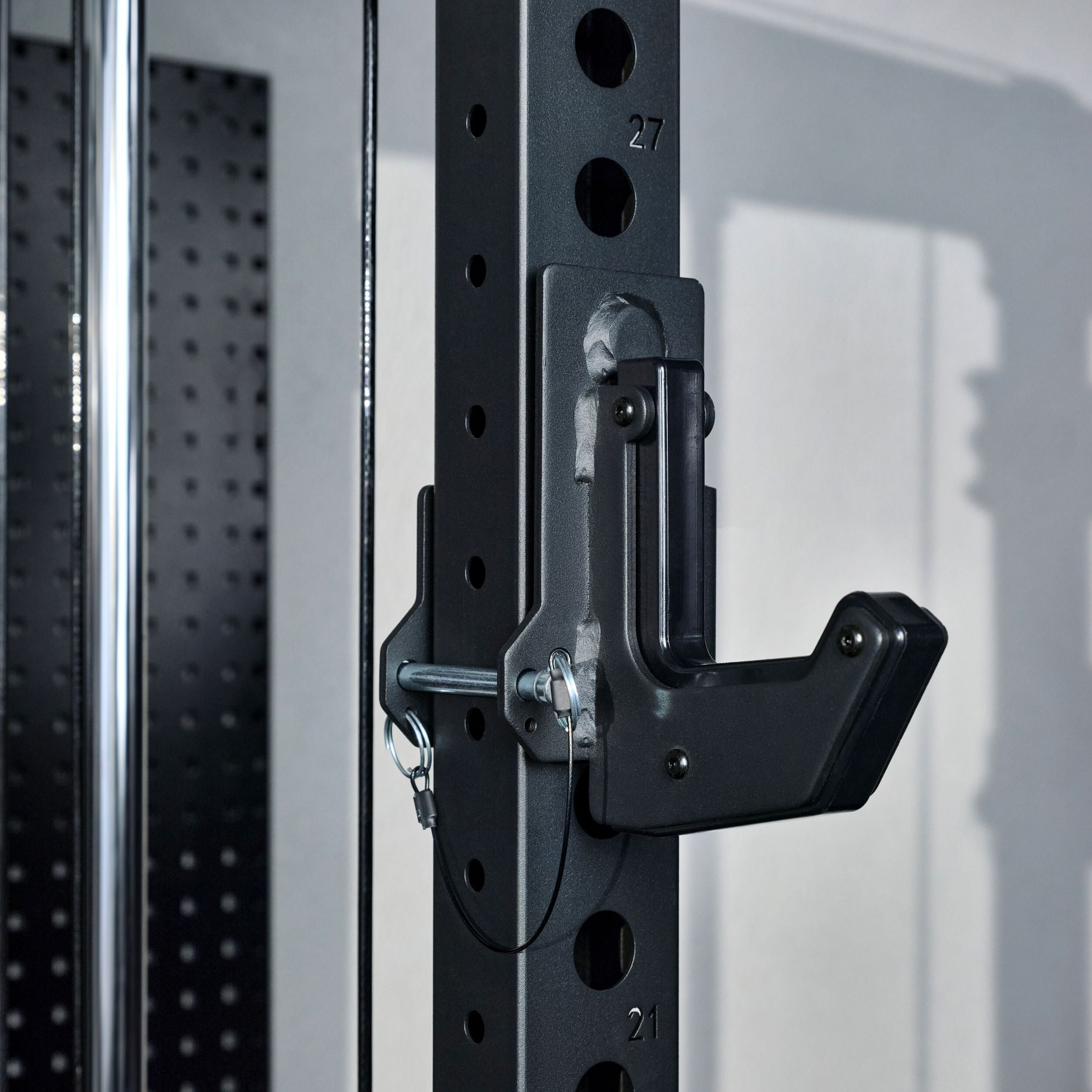Close-up of the sandwich J-hook attachment on the Major Fitness F22 Pro power rack featuring heavy-duty steel construction and adjustable upright positioning