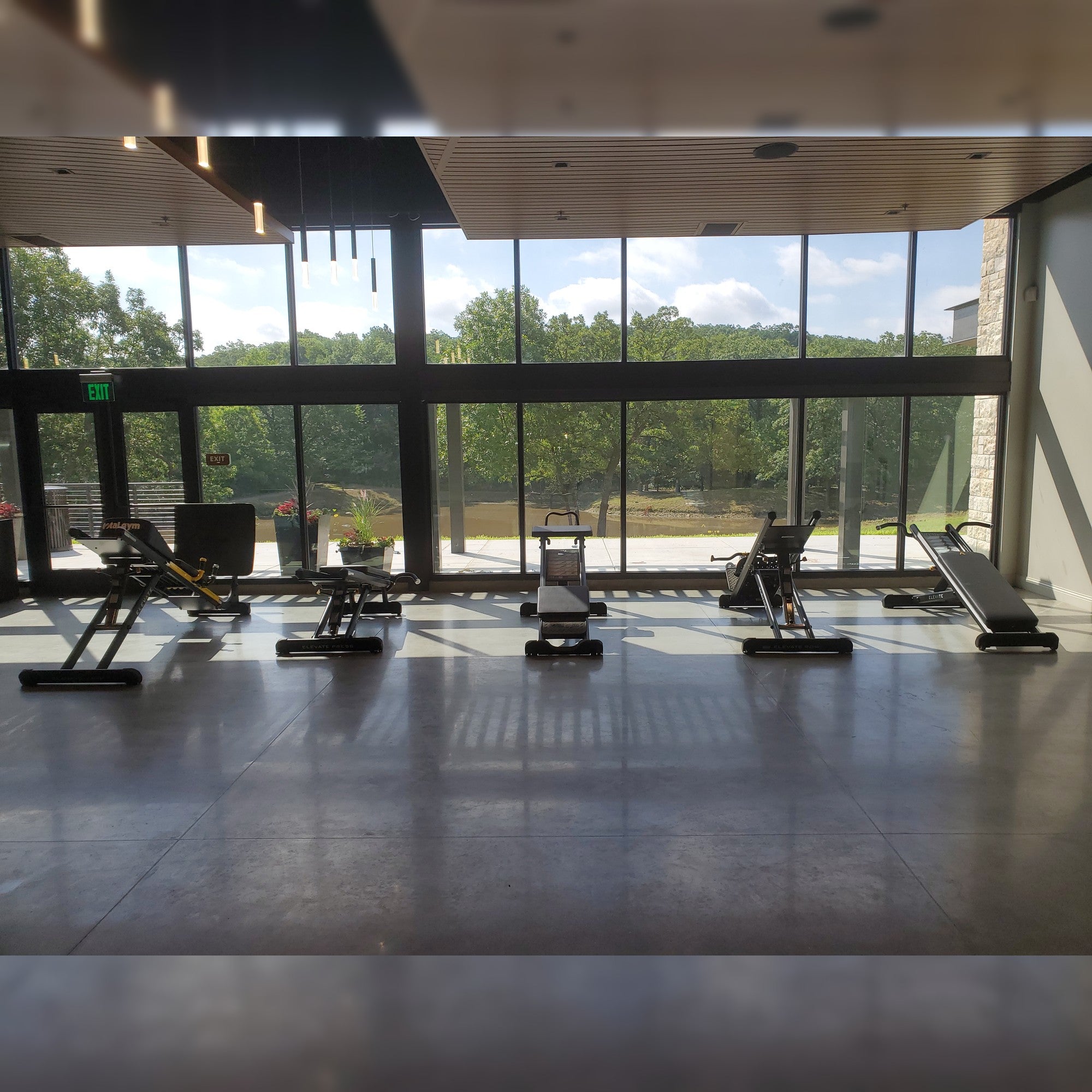 Total Gym ELEVATE Circuit 5-station commercial bodyweight training system installed in a modern fitness facility