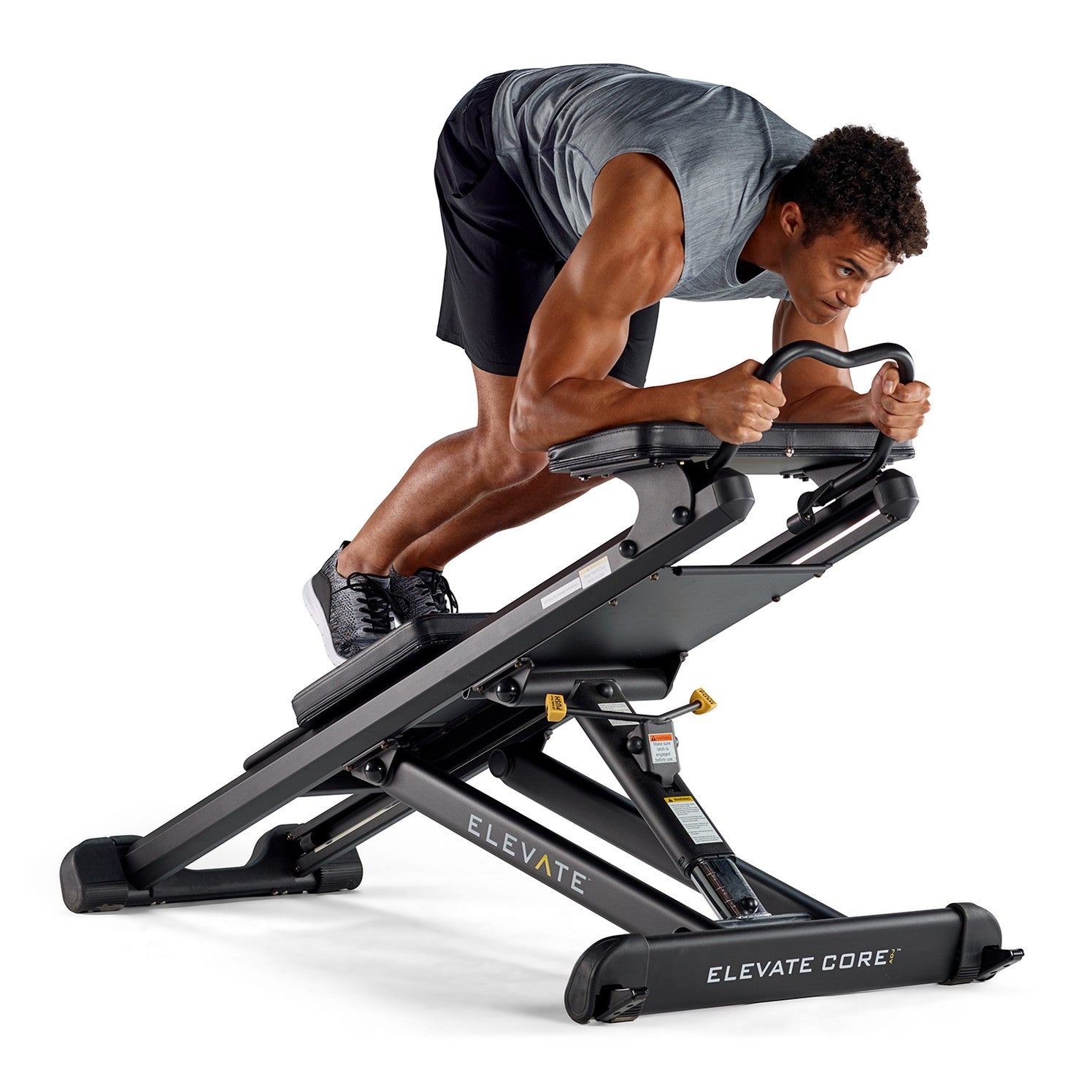 Person performing a SCRUNCH exercise on the Total Gym ELEVATE Core ADJ Adjustable Core Trainer to strengthen the core and abdominals